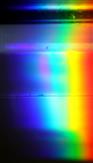 Sonnenstrahl prismatisch durch eine Glasscheibe(Aquarium) in seine Spektrallinien bzw. -bänder zerlegt